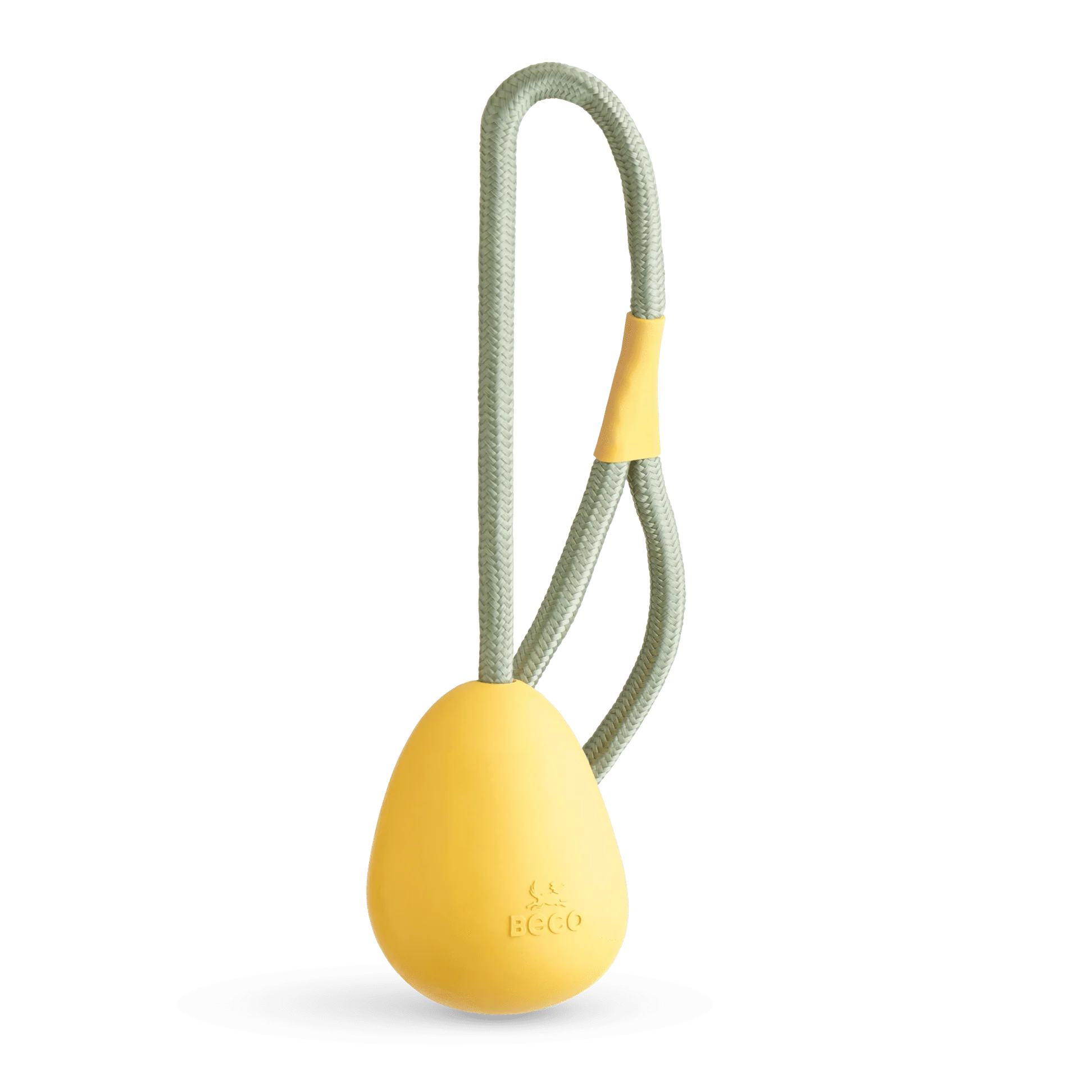 The Beco Slinger by The Tetbury Pet Shop & Grooming is an orange natural rubber fetch ball on a gray rope loop with an orange grip, designed for fun, interactive play with your dog.