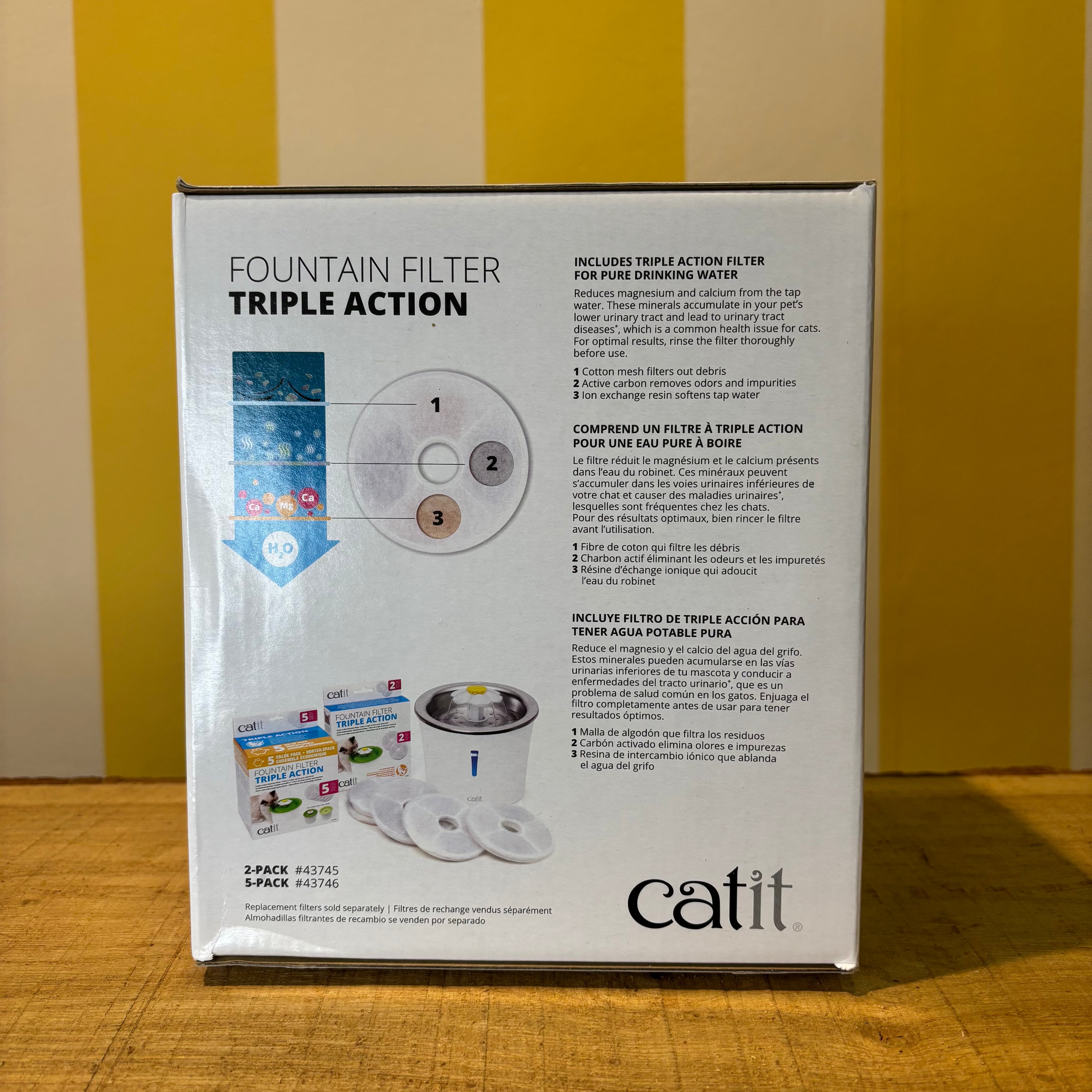 A box of The Tetbury Pet Shop & Grooming Catit Stainless Steel water fountain for cats, featuring a photo of a cat drinking from the 3-liter capacity fountain.